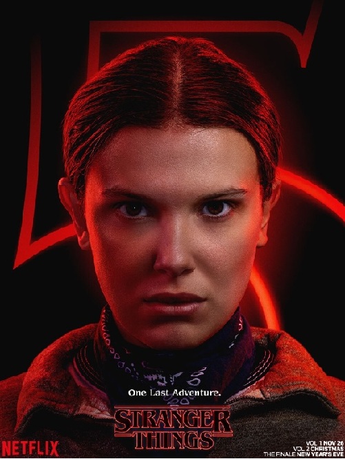 Eleven (Once) con el pelo rizado y una expresión seria.